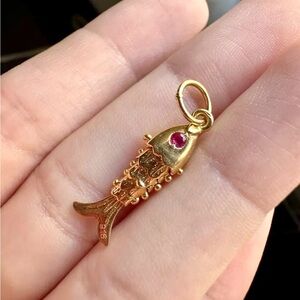 22k gold articulated fish charm w/ pink eyes